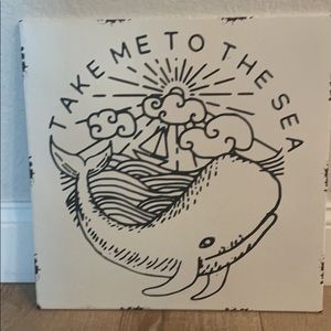 Whale artwork on metal